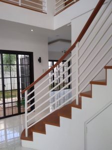 Two Storey Residential Building with Perimeter Fence and Gate Design